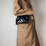 Small Chanel camera bag in patent leather