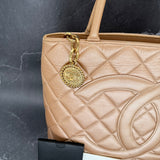 Rare Chanel Médallion in Pearl Gold
