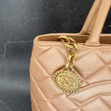 Rare Chanel Médallion in Pearl Gold