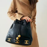 Chanel Triple Coco Drawstring Bag