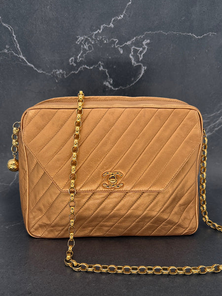 Chanel Diagonal Stitch Camera Bag in Gold